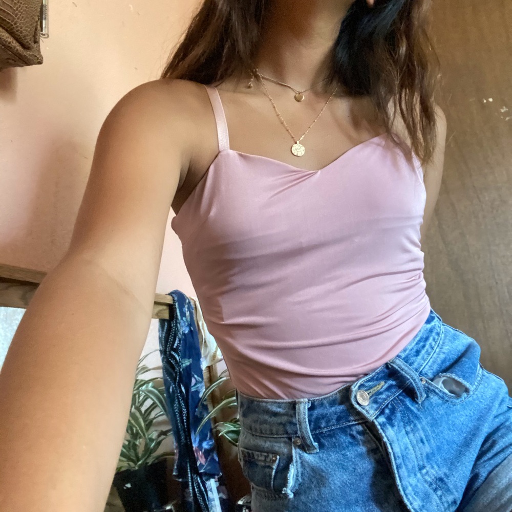 Pink body suit